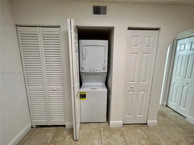 a view of bathroom with a door