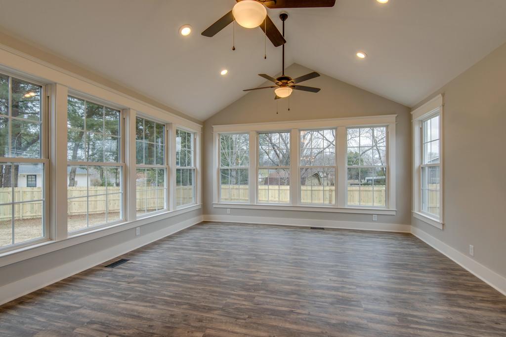 1200 Davidson Road Nashville, TN 37205 - Photo 12 of 30 a view of an empty room with wooden floor and a window