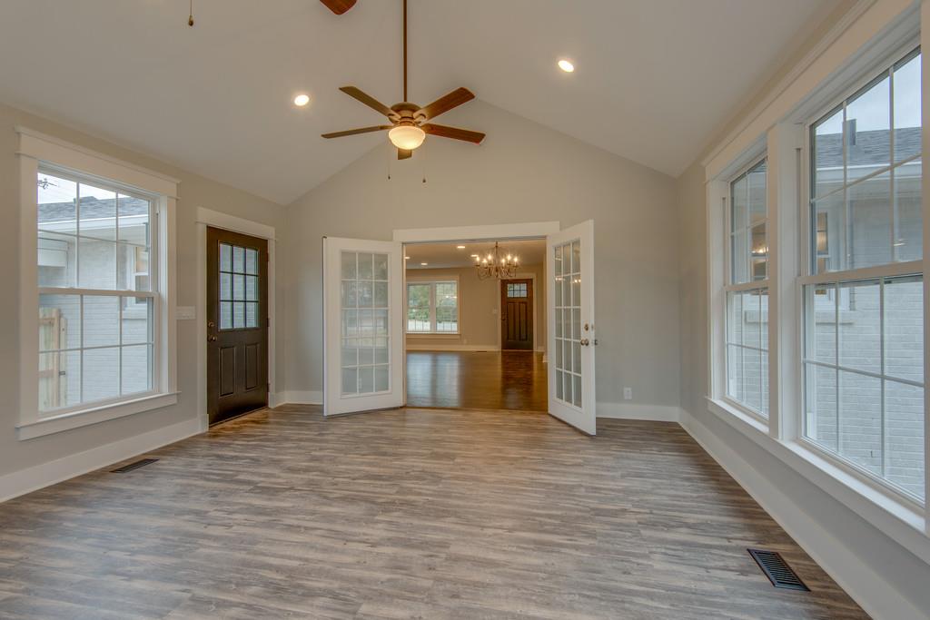 1200 Davidson Road Nashville, TN 37205 - Photo 13 of 30 a view of empty room with wooden floor and fan