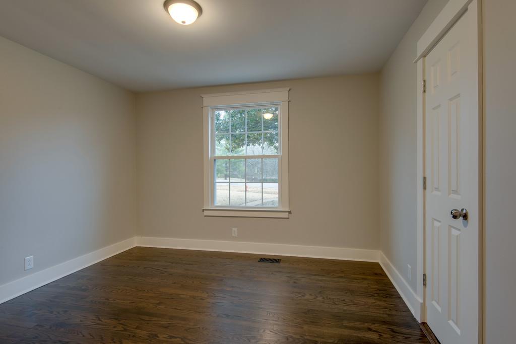 1200 Davidson Road Nashville, TN 37205 - Photo 19 of 30 a view of an empty room with wooden floor and a window