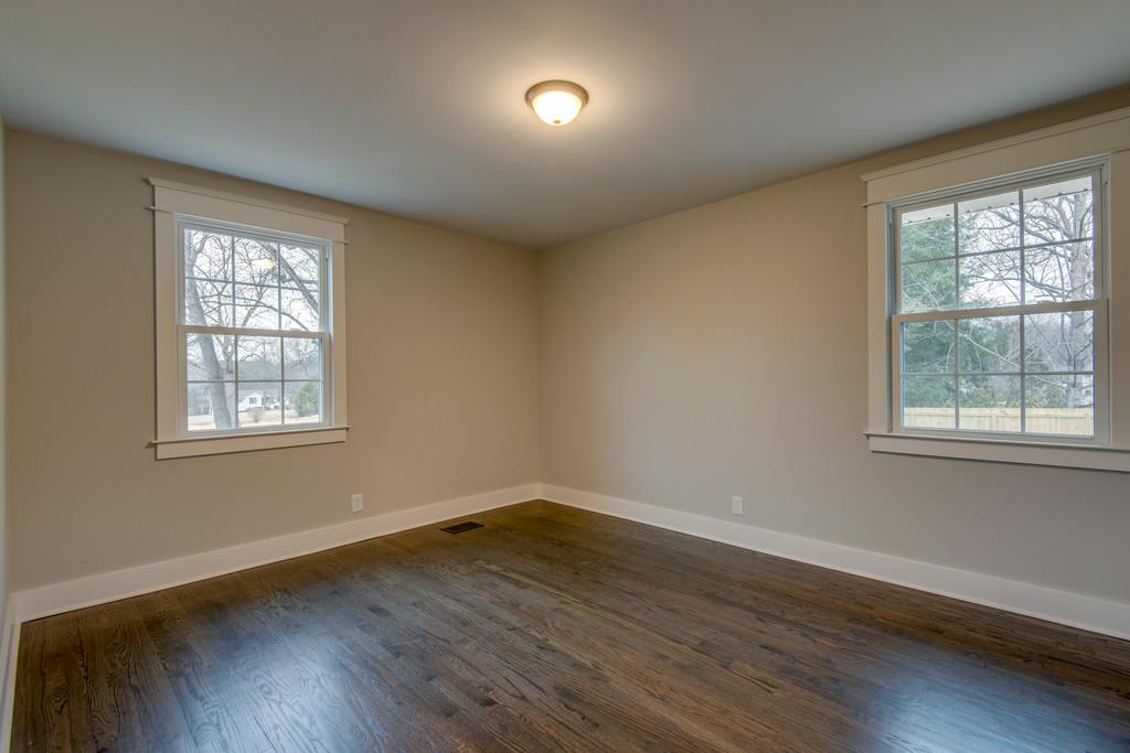 1200 Davidson Road Nashville, TN 37205 - Photo 23 of 30 a view of an empty room with wooden floor and a window