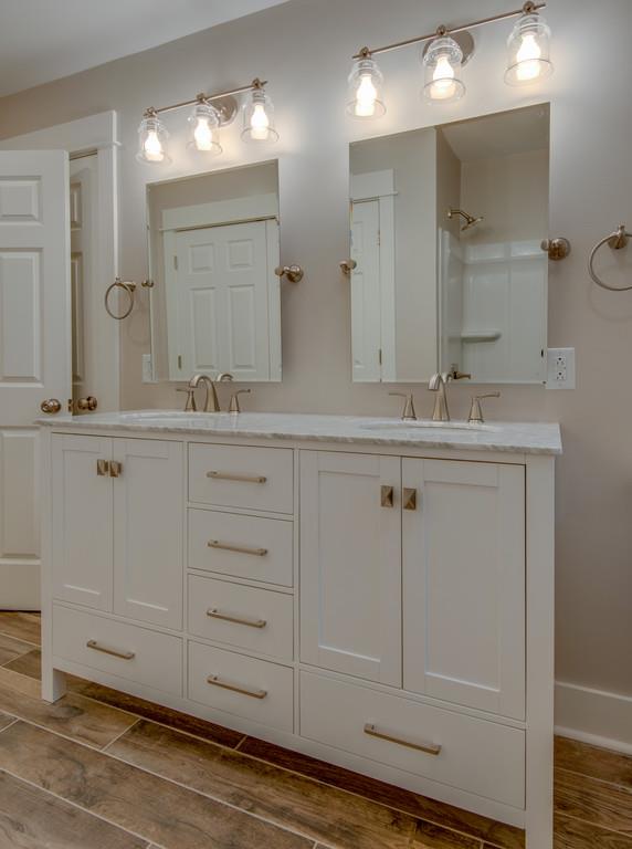 1200 Davidson Road Nashville, TN 37205 - Photo 26 of 30 a bathroom with a sink vanity and mirror
