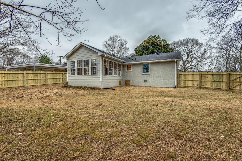 1200 Davidson Road Nashville, TN 37205 - Photo 30 of 30 a front view of a house with a garden