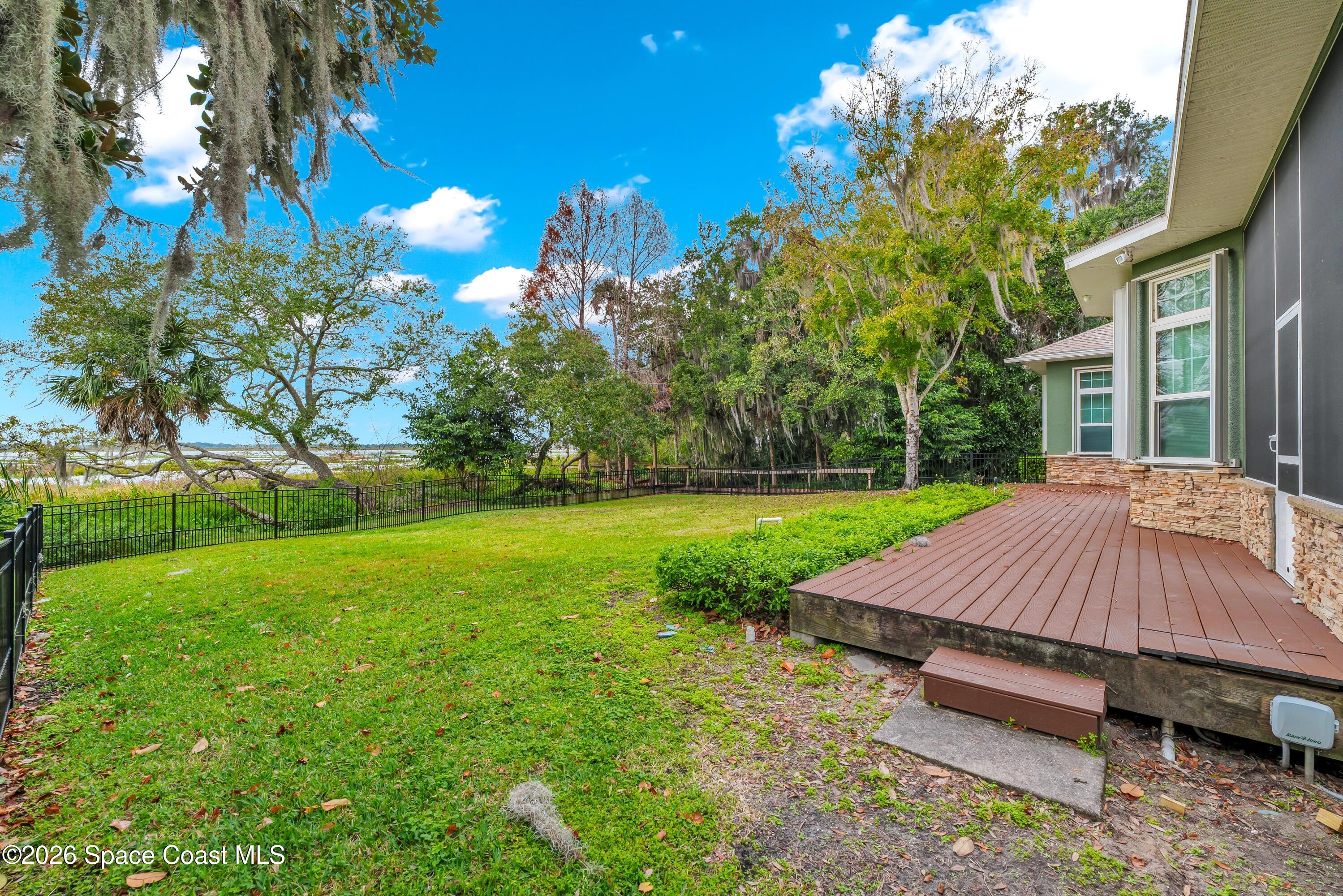 4150 Heller Road Titusville, FL 32796 - Photo 16 of 65 a view of a house with a yard