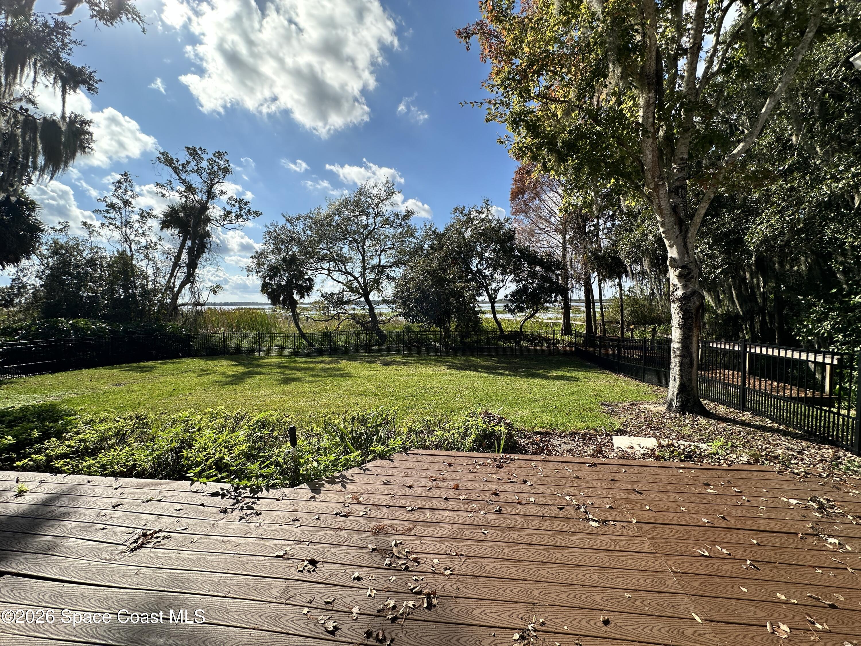 4150 Heller Road Titusville, FL 32796 - Photo 3 of 65 a view of backyard with green space