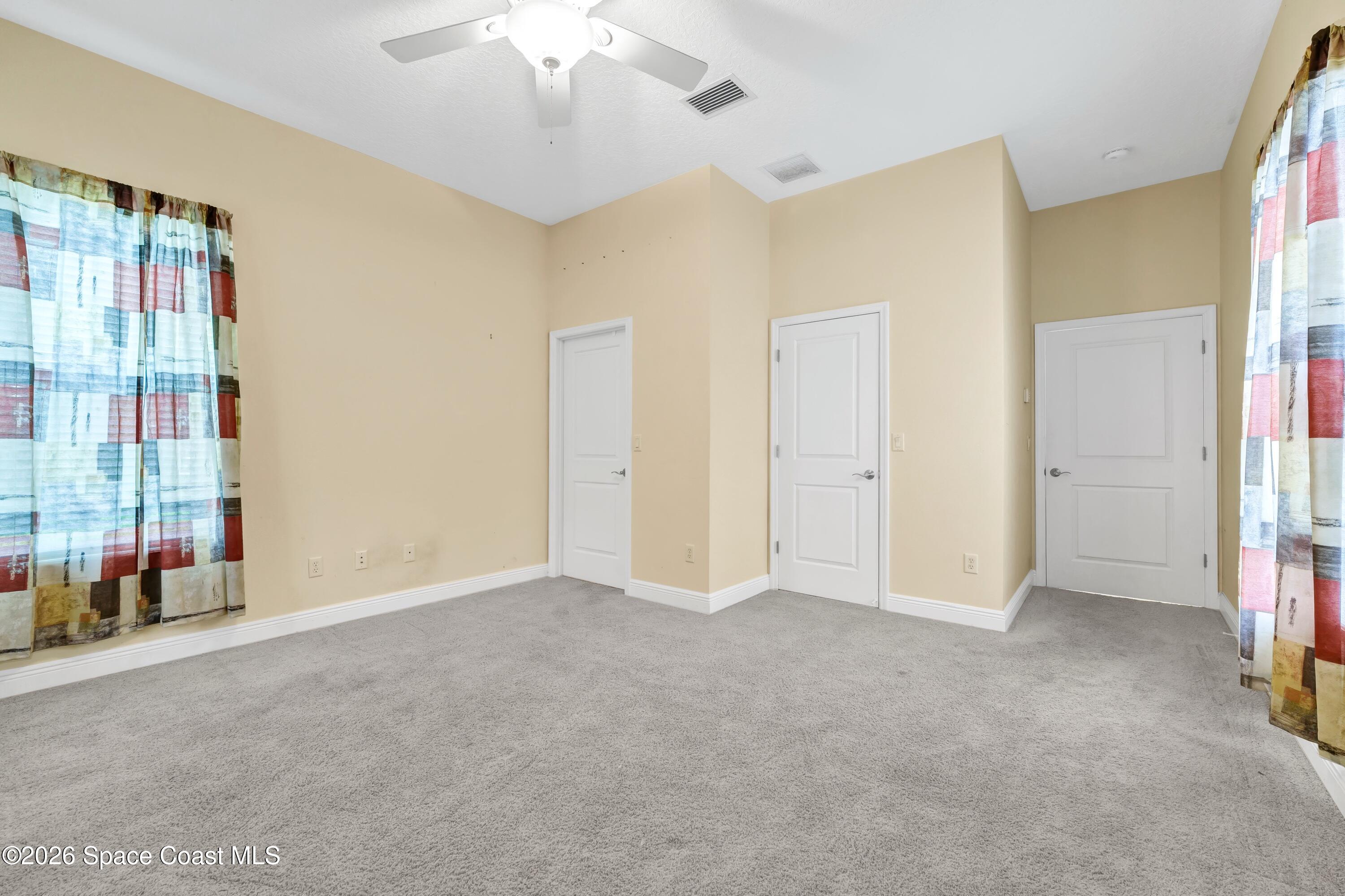 4150 Heller Road Titusville, FL 32796 - Photo 50 of 65 a view of an empty room with a window
