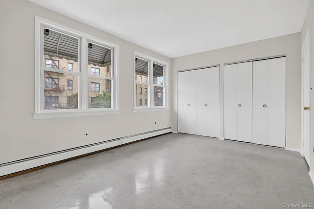 an empty room with windows