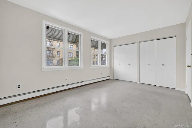 an empty room with windows