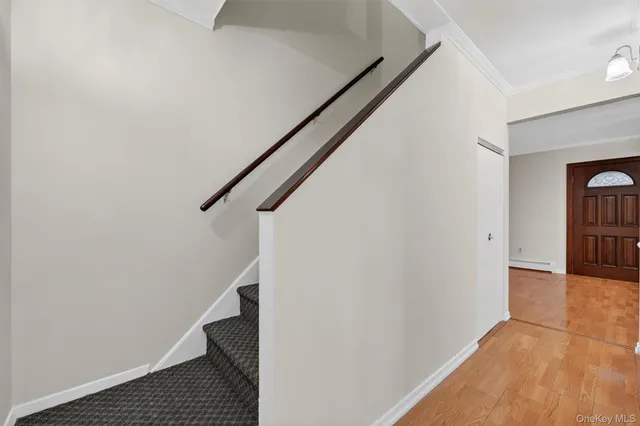 a view of entryway with stairs