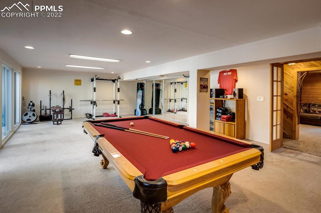 5030 Cedar Way Elizabeth, CO 80107 - Photo 16 of 33 a room with furniture and air hockey table