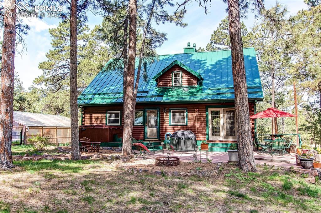5030 Cedar Way Elizabeth, CO 80107 - Photo 22 of 33 a front view of a house with garden