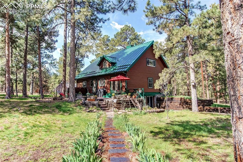 5030 Cedar Way Elizabeth, CO 80107 - Photo 23 of 33 a view of a house with a yard