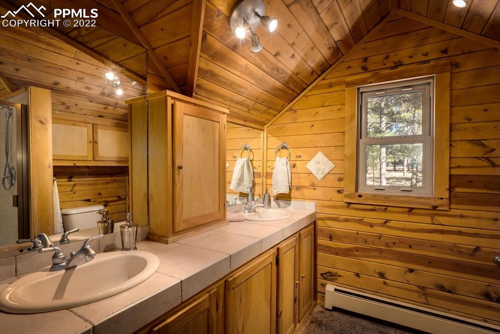 5030 Cedar Way Elizabeth, CO 80107 - Photo 10 of 33 a bathroom with a sink and a mirror