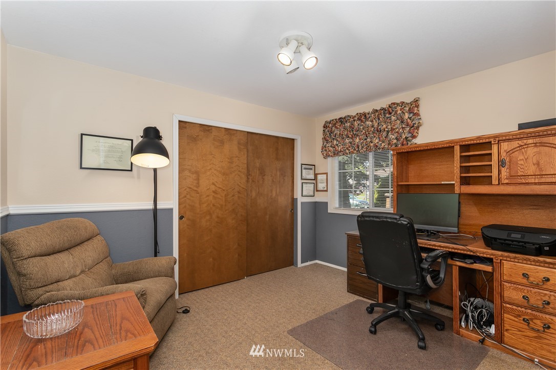 2003 237th Street Southeast Bothell, WA 98021 - Photo 19 of 25 a workspace with furniture and a window