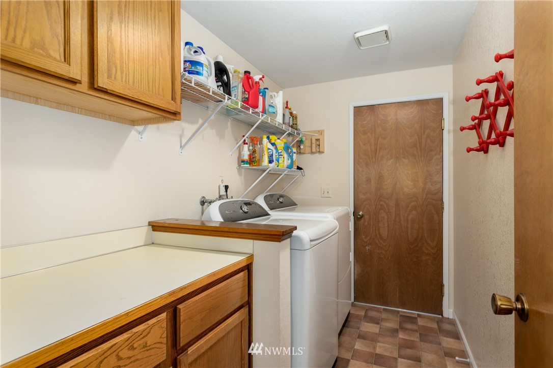 2003 237th Street Southeast Bothell, WA 98021 - Photo 21 of 25 a utility room with dryer and washer