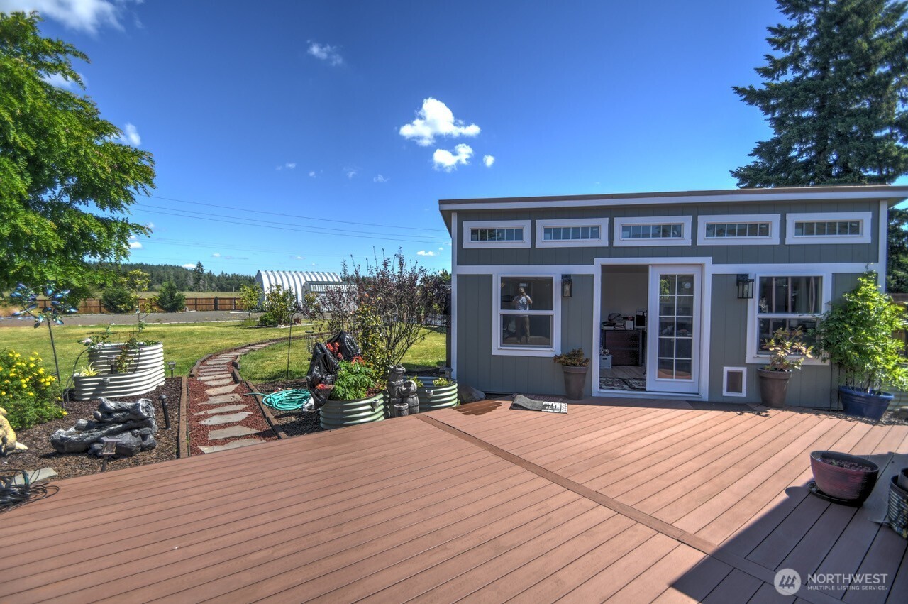 5922 184th Lane Southwest Rochester, WA 98579 - Photo 20 of 34 a view of a house with a patio