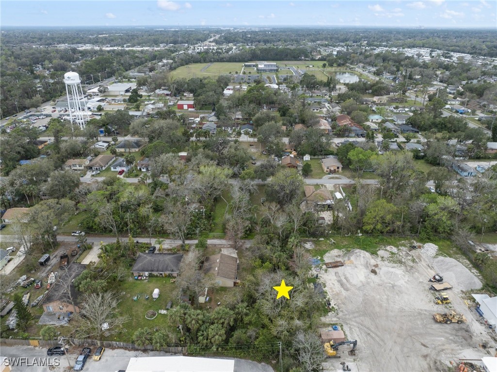 1137 Cave Avenue Holly Hill, FL 32117 - Photo 12 of 12 an aerial view of house with yard and mountain view in back