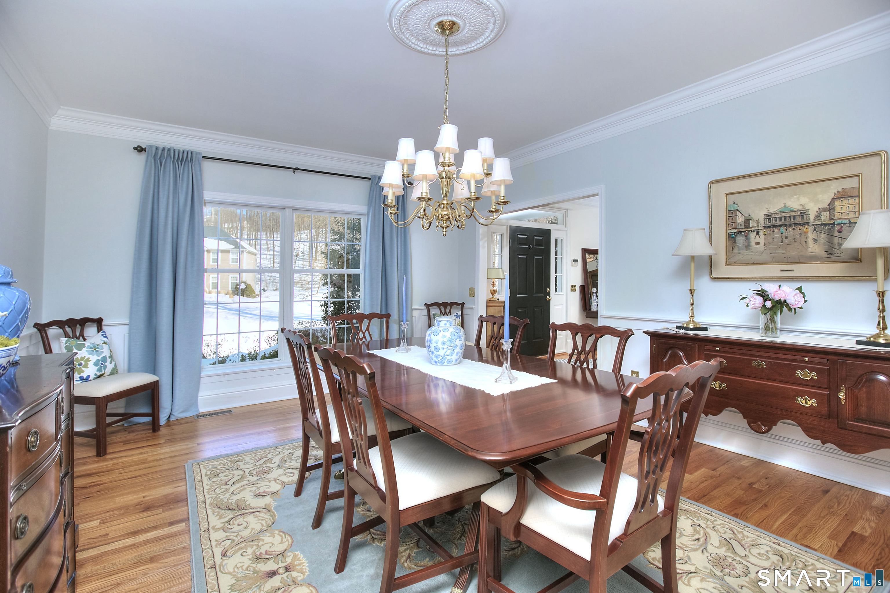 28 Great Pond Road Ridgefield, CT 06877 - Photo 21 of 40 a view of a dining room with furniture window and wooden floor
