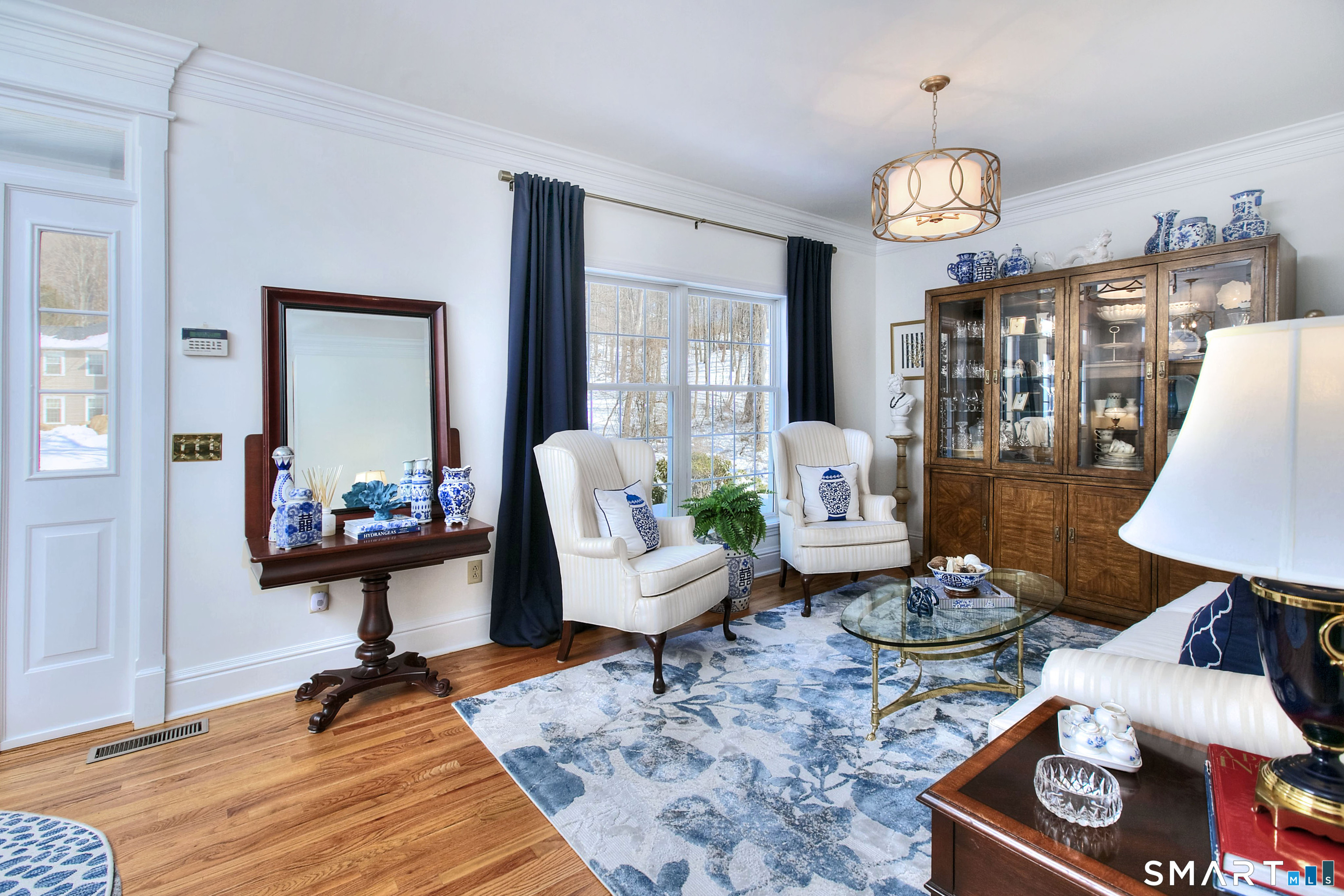 28 Great Pond Road Ridgefield, CT 06877 - Photo 22 of 40 a living room with furniture and a table