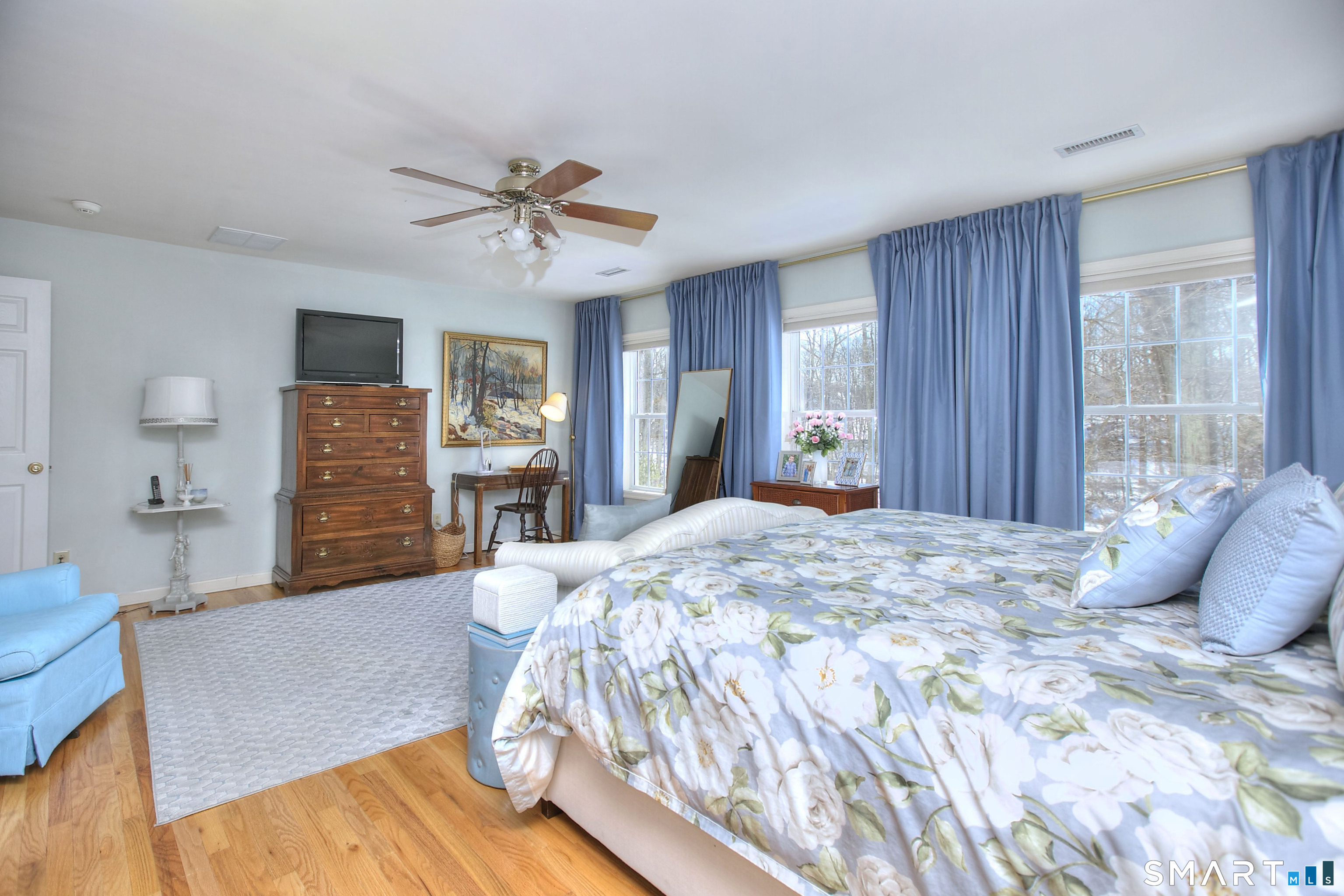 28 Great Pond Road Ridgefield, CT 06877 - Photo 26 of 40 a bedroom with a bed and a large window