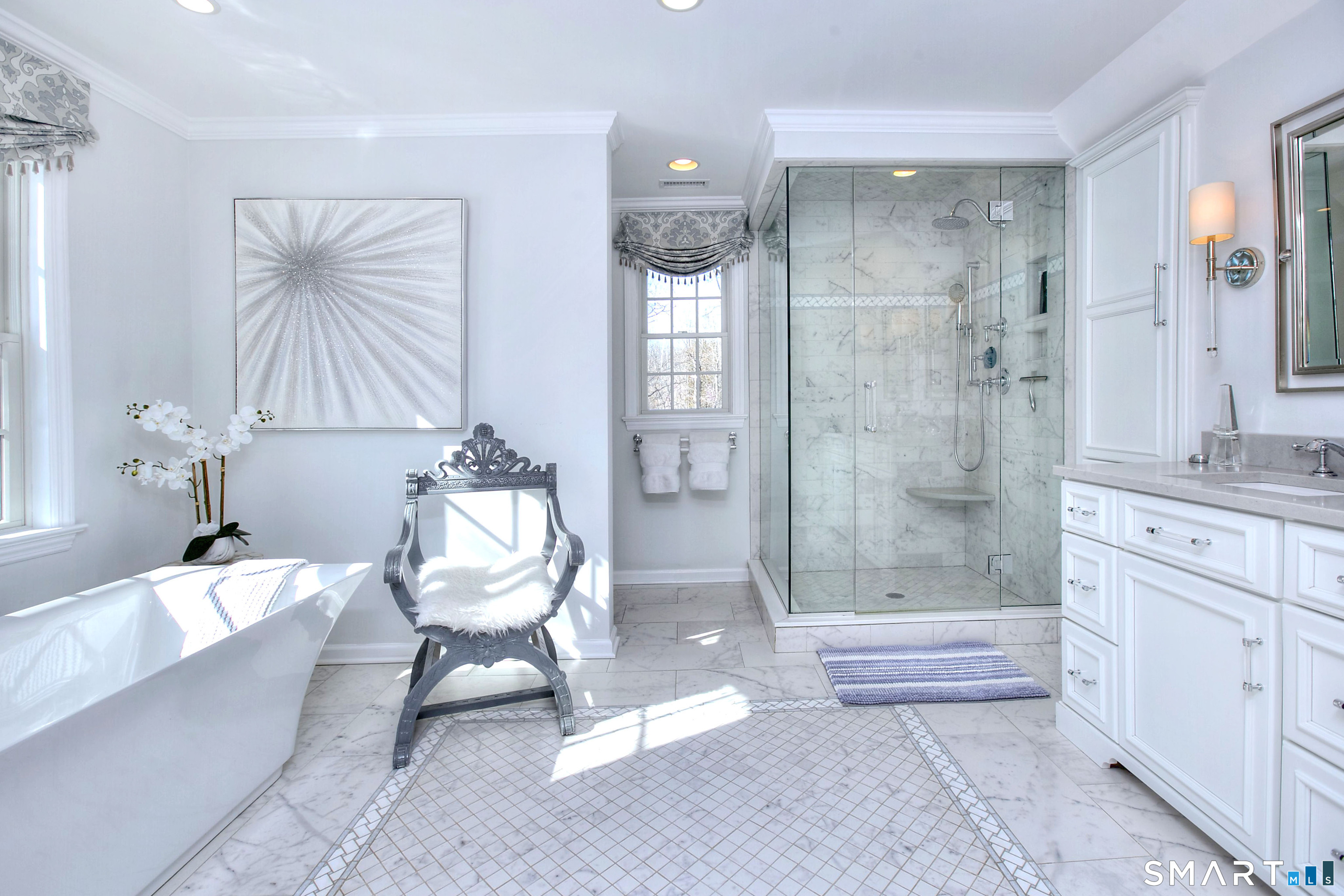 28 Great Pond Road Ridgefield, CT 06877 - Photo 27 of 40 a bathroom with a bathtub shower sink and toilet