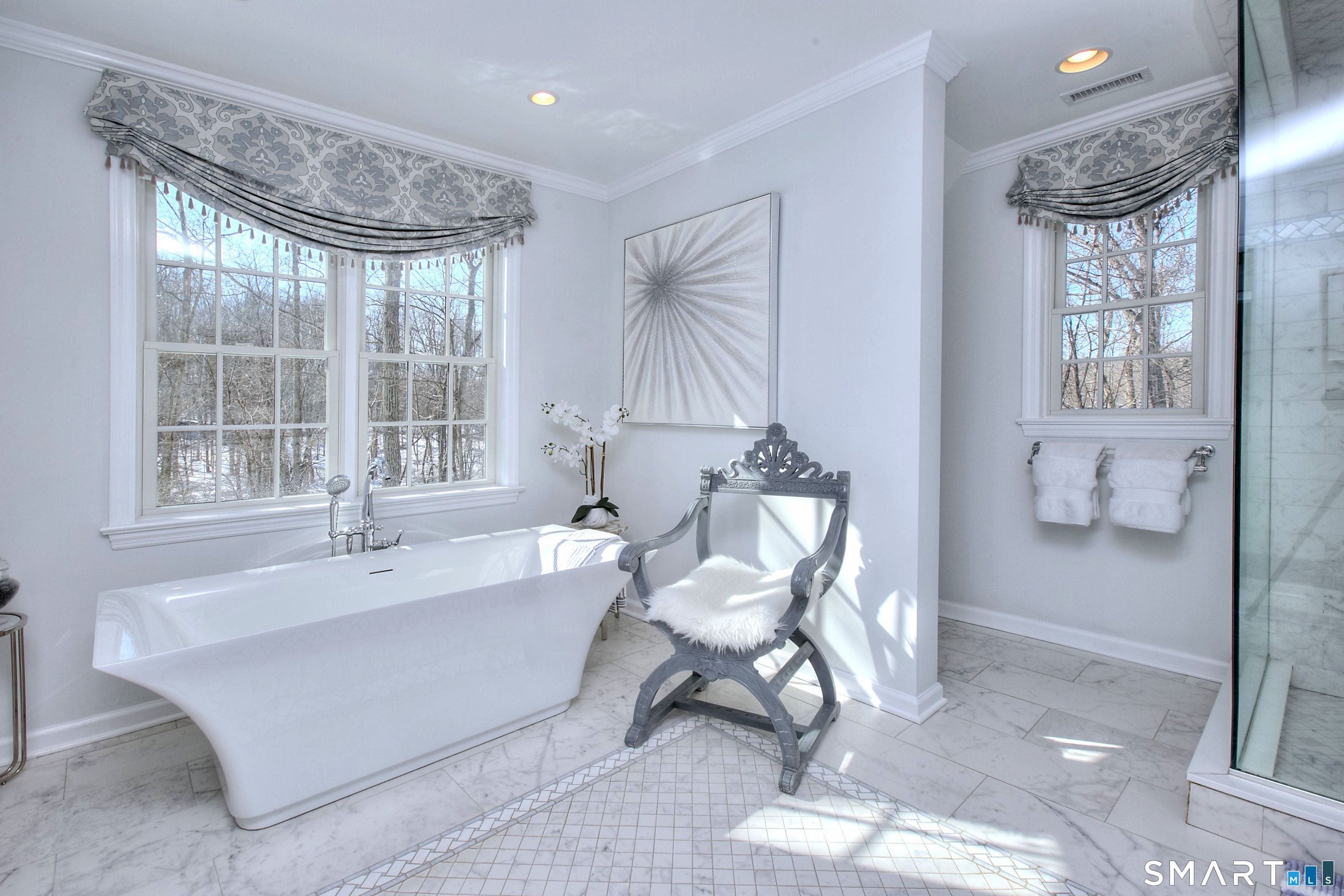 28 Great Pond Road Ridgefield, CT 06877 - Photo 28 of 40 a living room with furniture and a large window