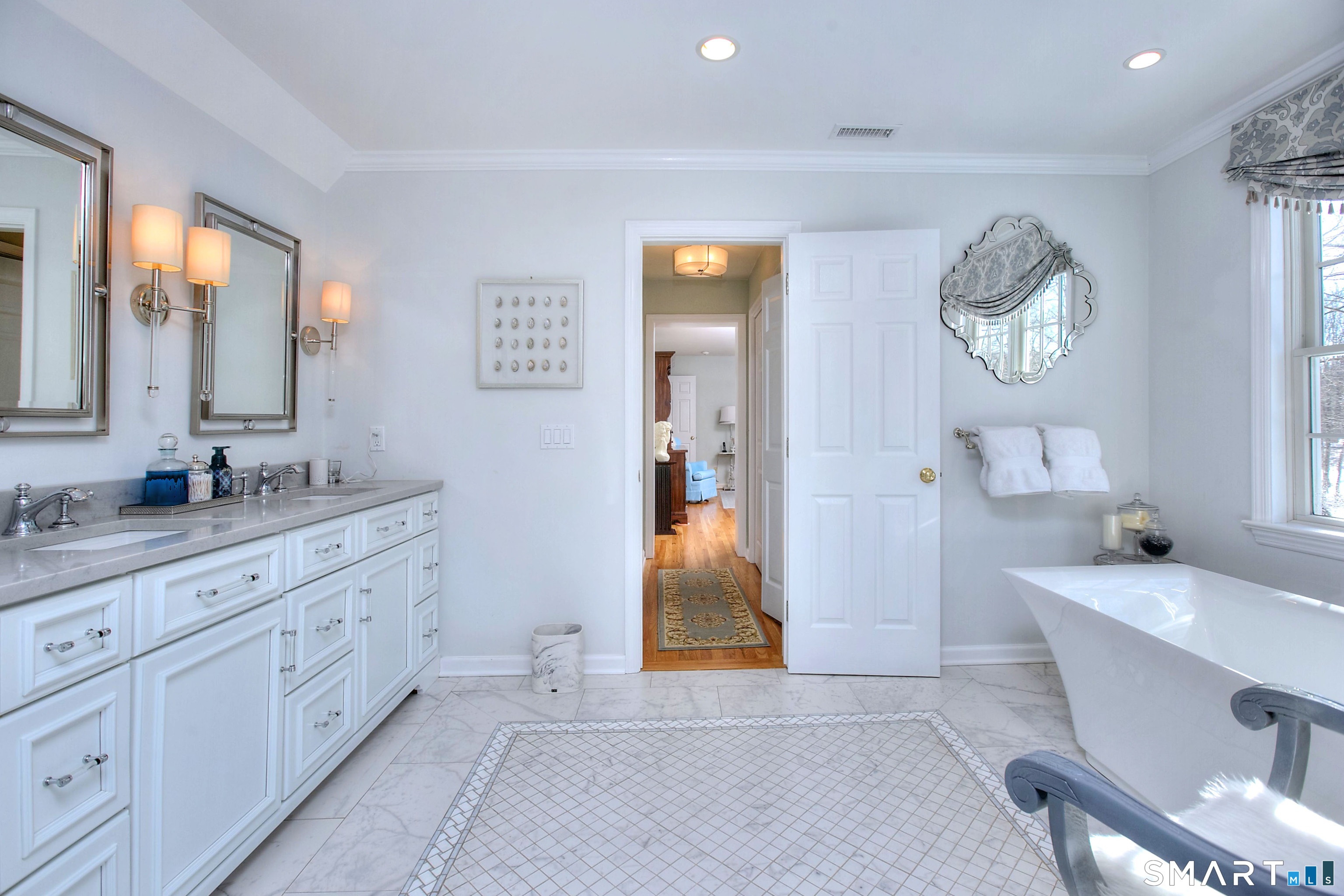 28 Great Pond Road Ridgefield, CT 06877 - Photo 31 of 40 a spacious bathroom with 2 sink tub and a mirror