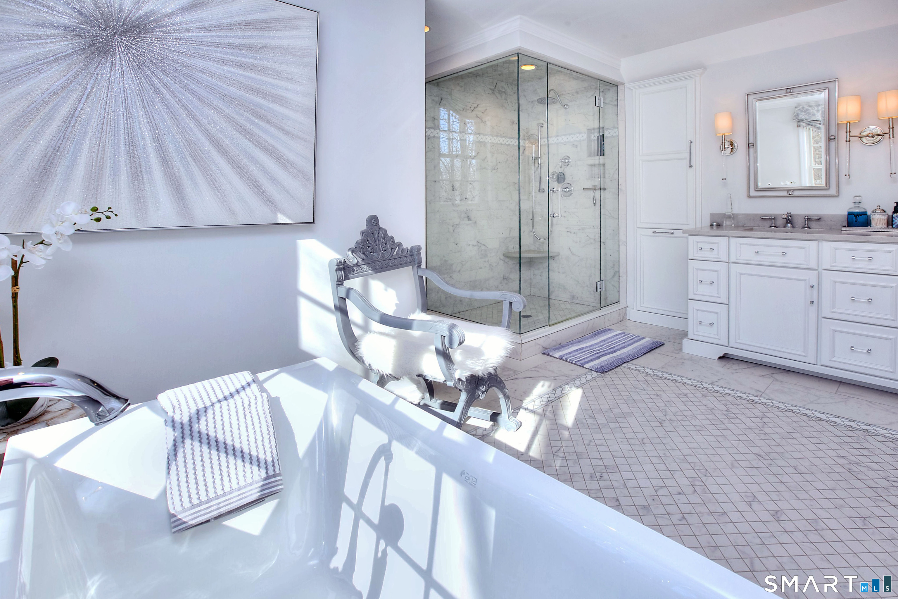 28 Great Pond Road Ridgefield, CT 06877 - Photo 32 of 40 a bathroom with a sink and a mirror