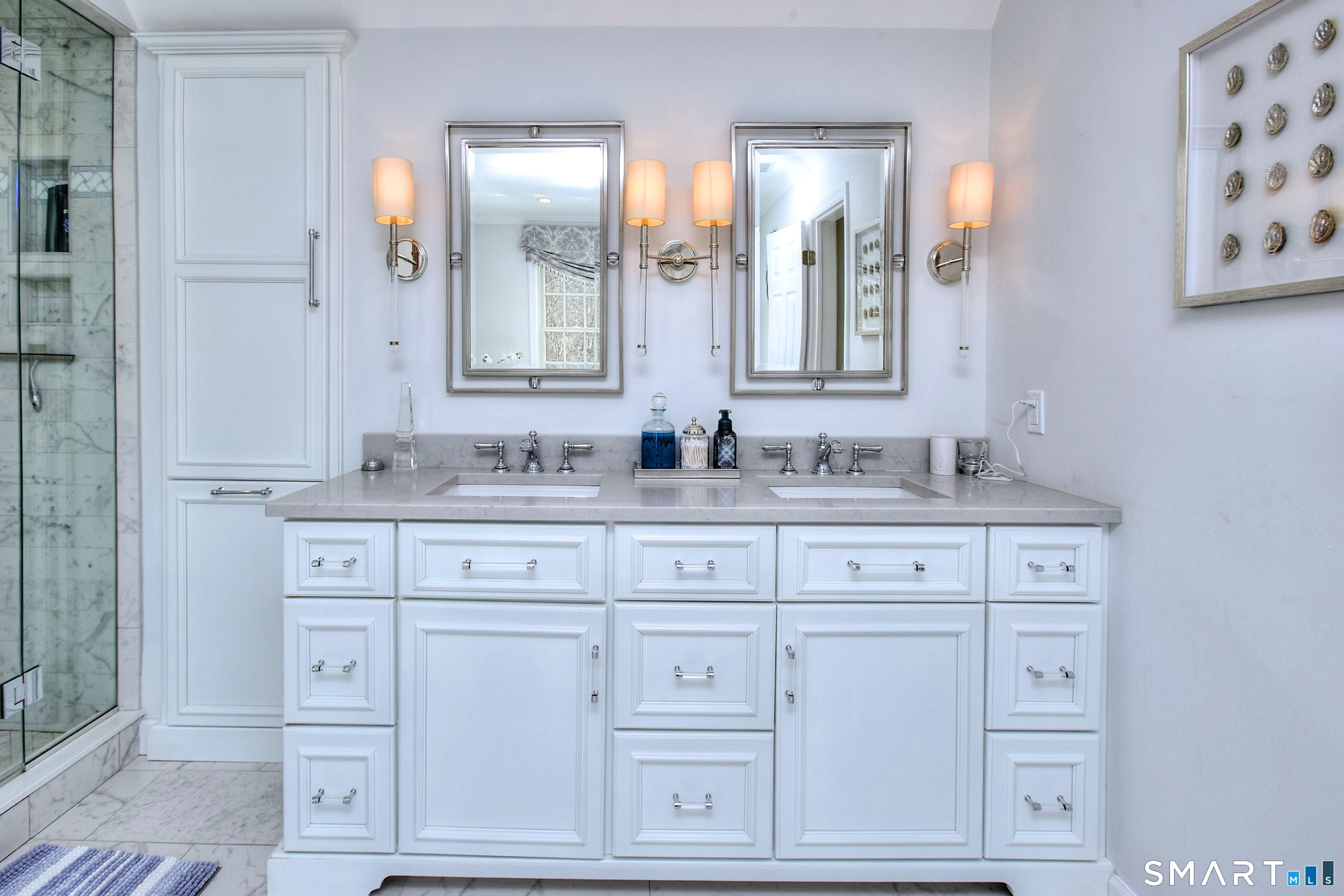 28 Great Pond Road Ridgefield, CT 06877 - Photo 33 of 40 a bathroom with white cabinets and a sink
