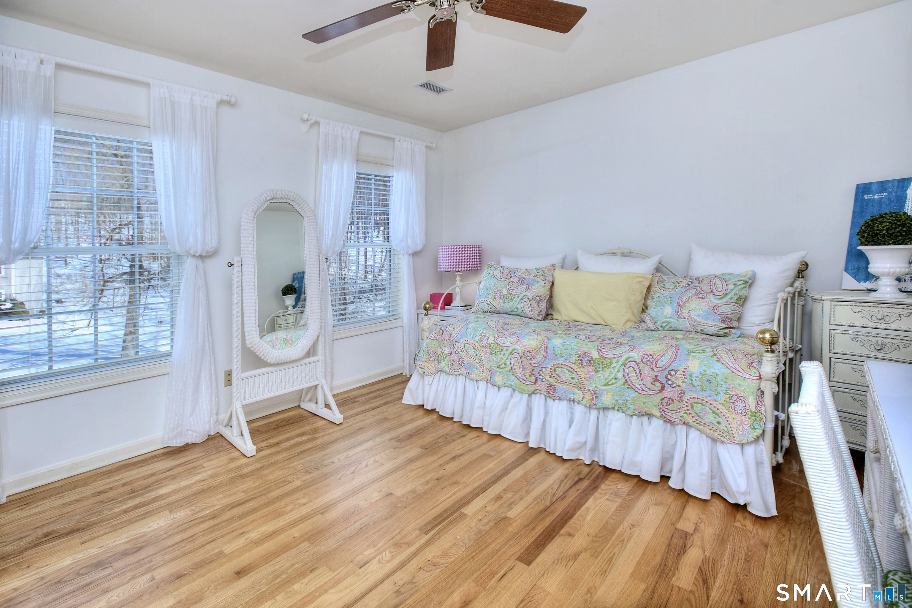 28 Great Pond Road Ridgefield, CT 06877 - Photo 34 of 40 a living room with a bed furniture and a window