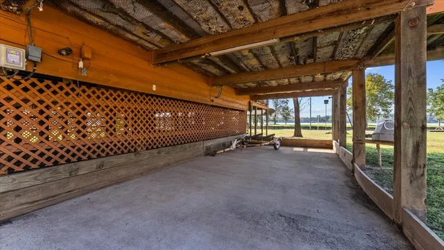 a view of a room with wooden walls