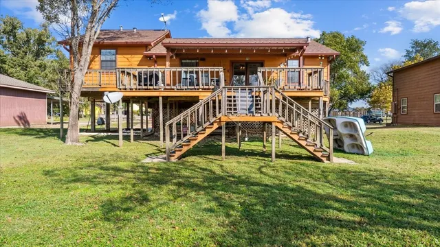 front view of an house with a yard