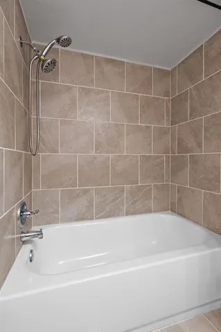 a view of a bathtub in a bathroom