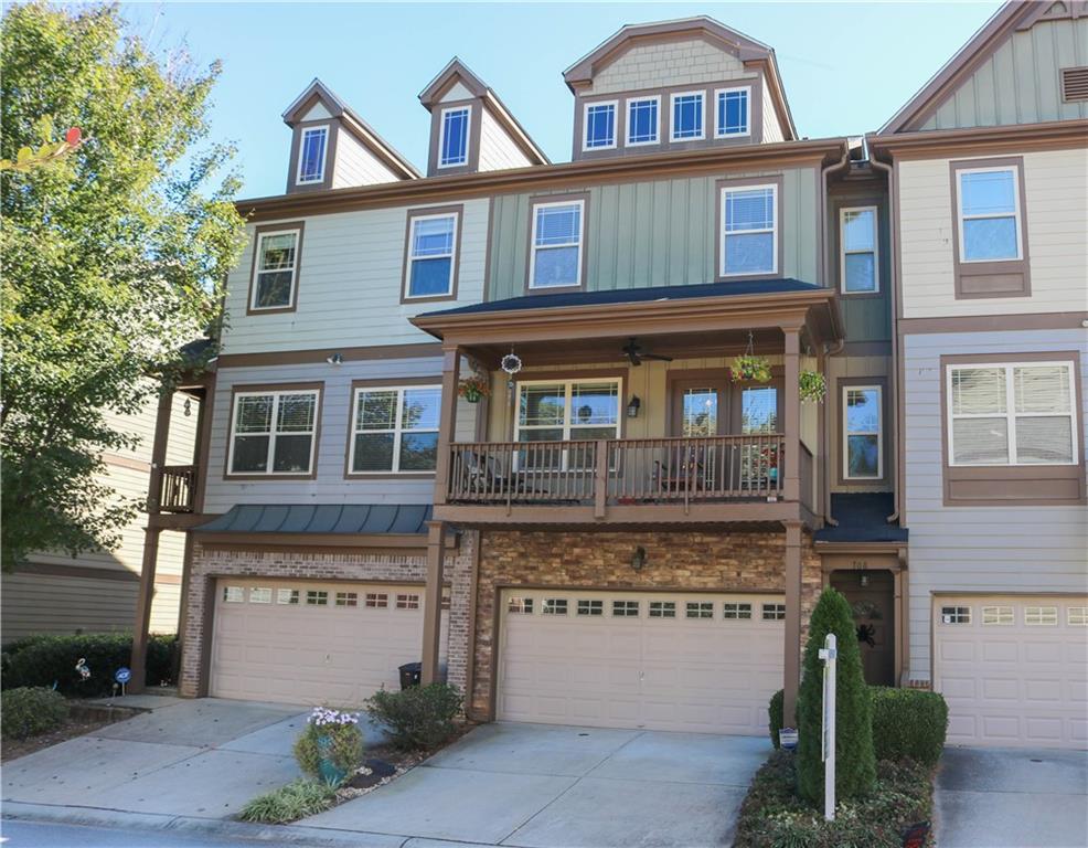 708 Emeril Drive Decatur, GA 30032 - Photo 1 of 1 a front view of a house with yard and parking