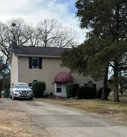a car parked in front of a house