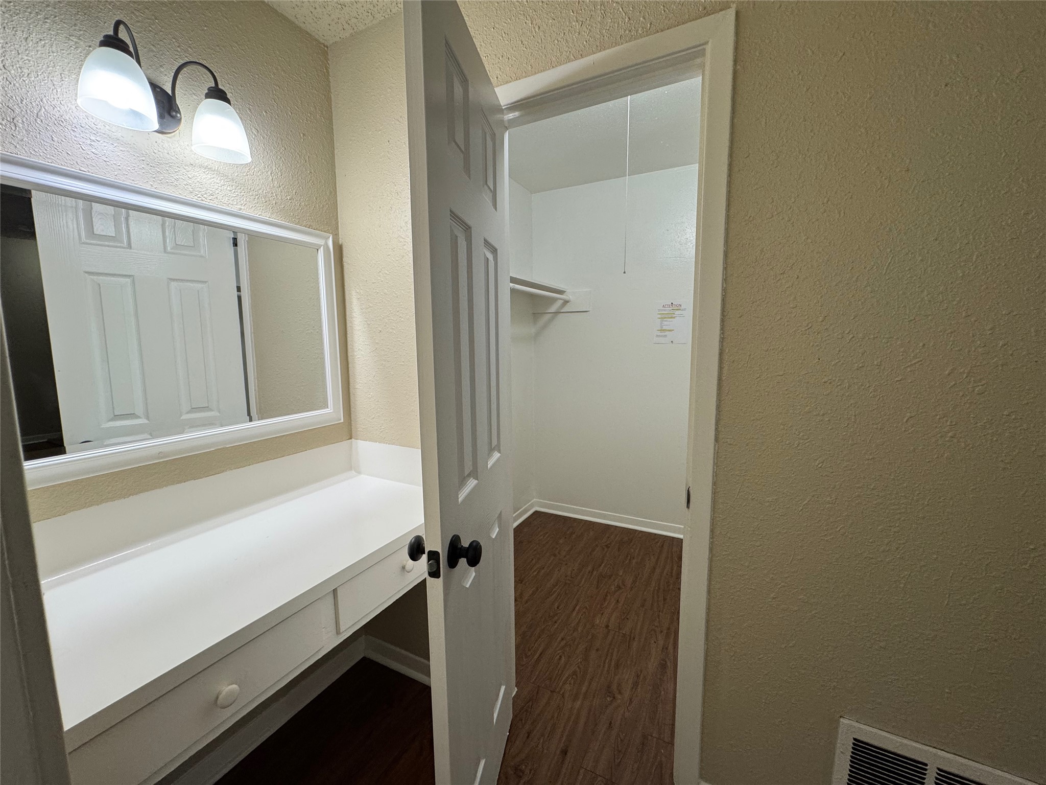 5006 West Wind Trail, Unit 104 Austin, TX 78745 - Photo 13 of 20 a bathroom with a sink and a mirror