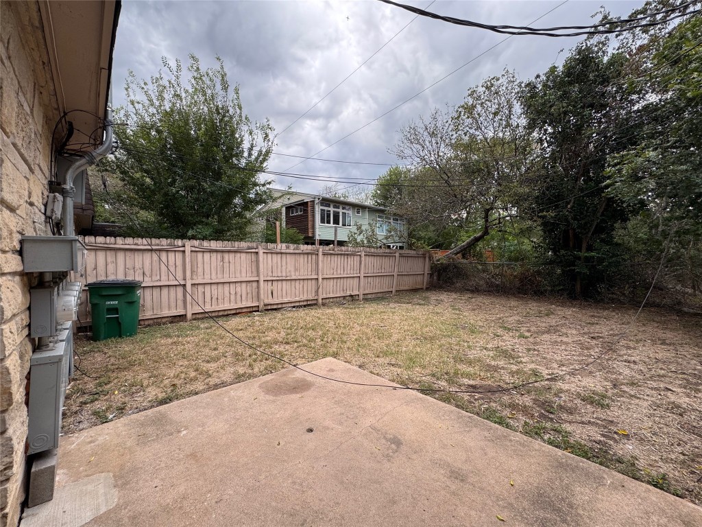 5006 West Wind Trail, Unit 104 Austin, TX 78745 - Photo 16 of 20 a backyard of a house