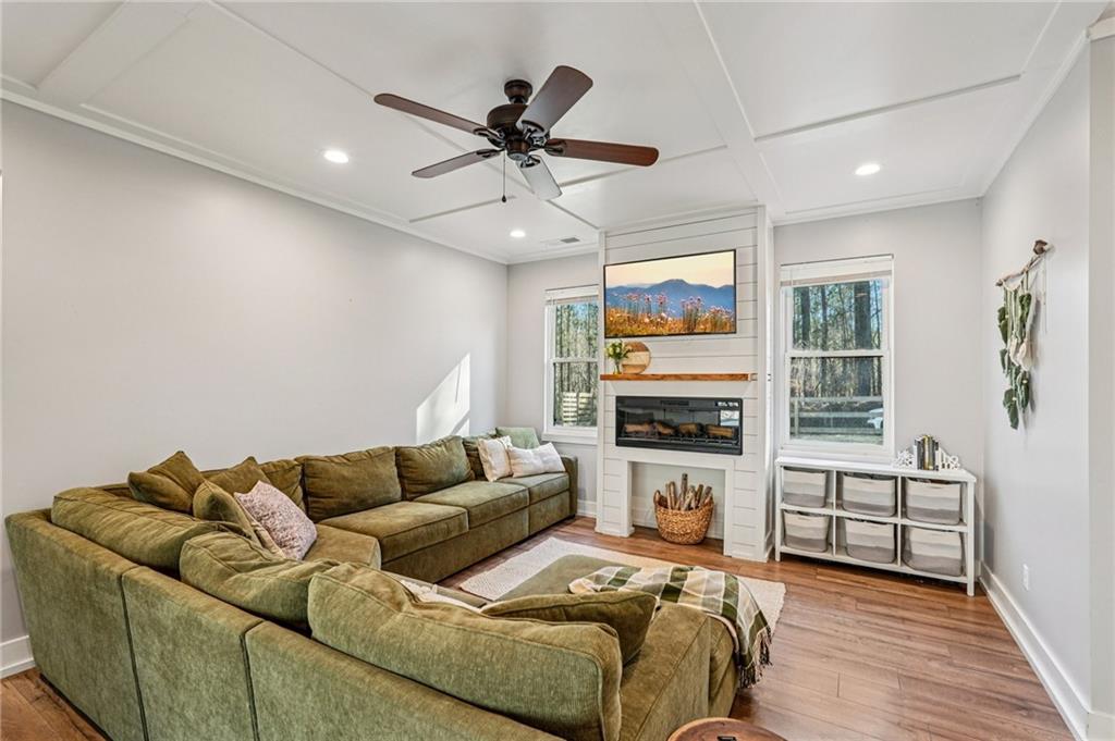 744 Narroway Trail Dallas, GA 30132 - Photo 12 of 59 a living room with furniture fireplace and flat screen tv