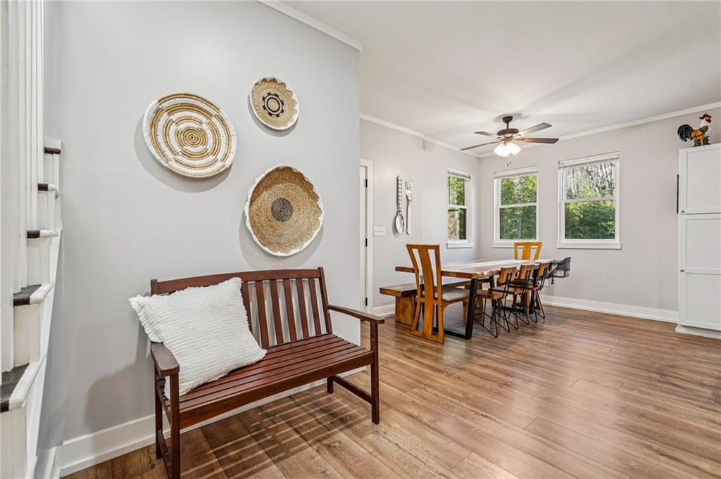 744 Narroway Trail Dallas, GA 30132 - Photo 15 of 59 a view of a dining room with furniture window and wooden floor