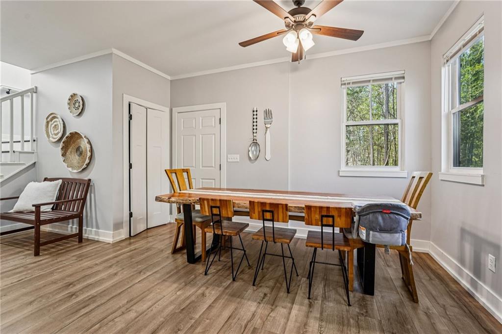 744 Narroway Trail Dallas, GA 30132 - Photo 17 of 59 a view of a dining room with furniture window and wooden floor