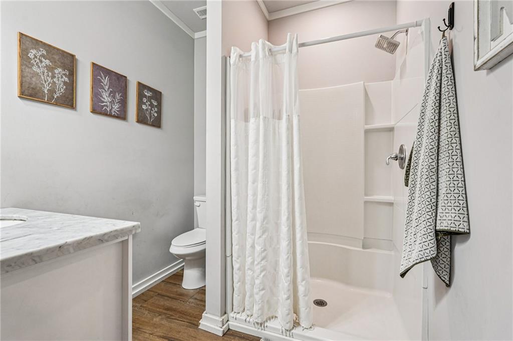 744 Narroway Trail Dallas, GA 30132 - Photo 24 of 59 a bathroom with a shower and a toilet