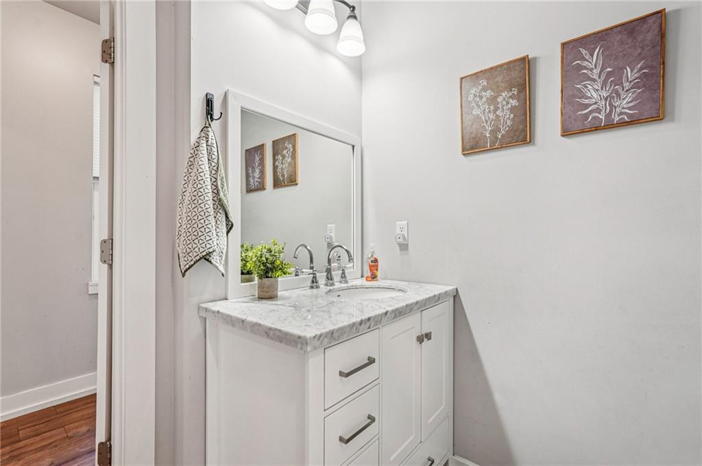 744 Narroway Trail Dallas, GA 30132 - Photo 25 of 59 a bathroom with a sink vanity and a mirror