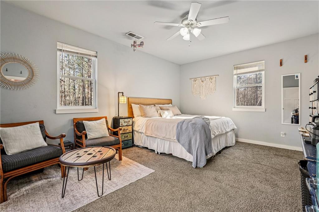 744 Narroway Trail Dallas, GA 30132 - Photo 27 of 59 a bedroom with a bed furniture and window