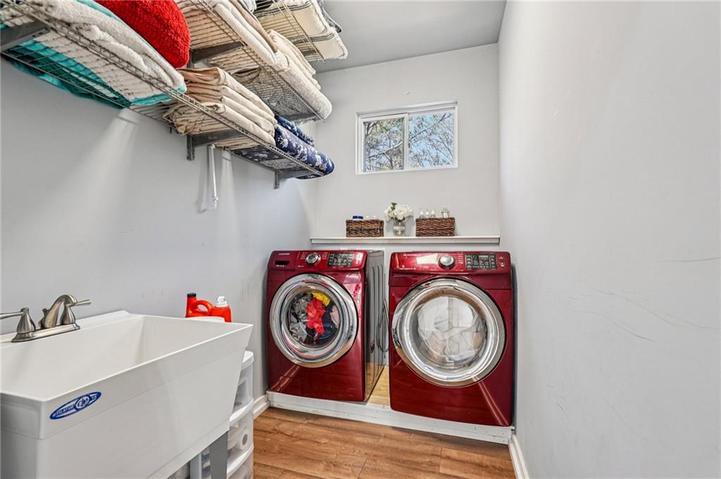 744 Narroway Trail Dallas, GA 30132 - Photo 31 of 59 a utility room with dryer and washer