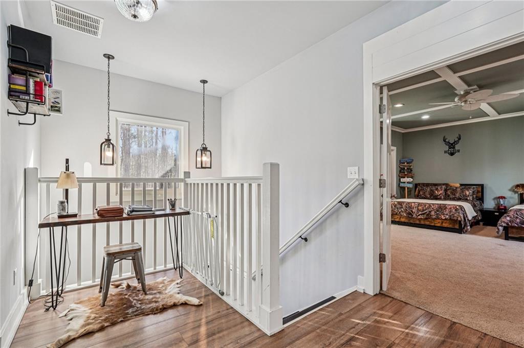 744 Narroway Trail Dallas, GA 30132 - Photo 36 of 59 a view of a livingroom with a hall and an entryway