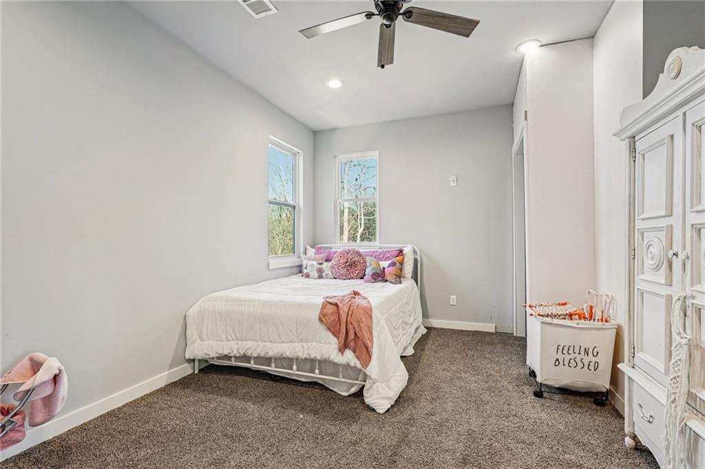 744 Narroway Trail Dallas, GA 30132 - Photo 38 of 59 a bed room with a bed and a window