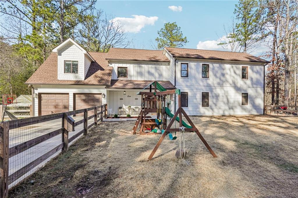 744 Narroway Trail Dallas, GA 30132 - Photo 4 of 59 a view of a house with a wooden deck