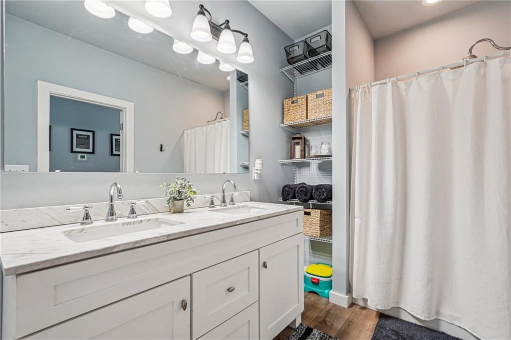 744 Narroway Trail Dallas, GA 30132 - Photo 41 of 59 a bathroom with a sink a vanity and a mirror