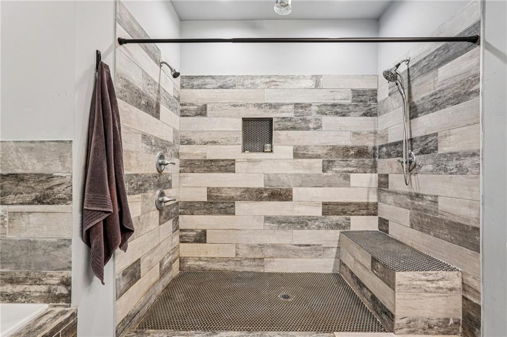 744 Narroway Trail Dallas, GA 30132 - Photo 47 of 59 a bathroom with a tub and shower