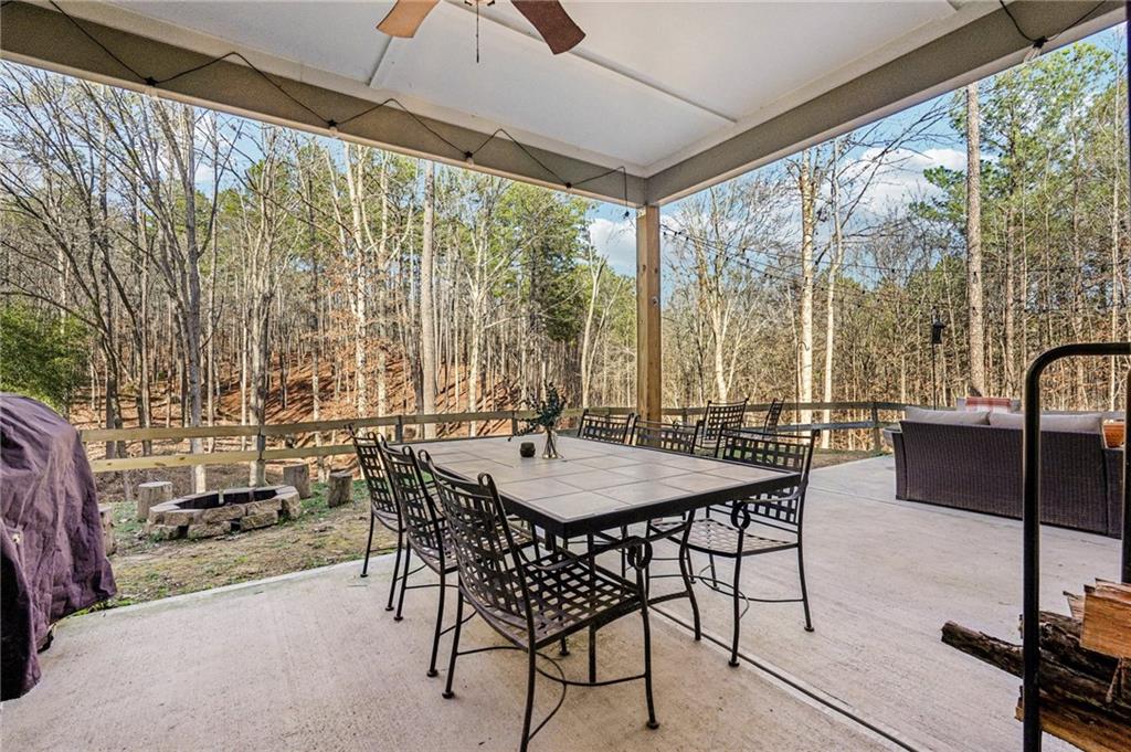 744 Narroway Trail Dallas, GA 30132 - Photo 49 of 59 a view of a dining room with furniture window and outside view